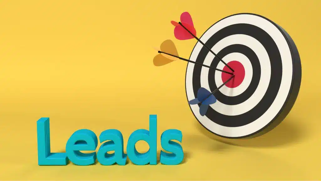 A target with three arrows in the bullseye and the word 'Leads' in blue text on a yellow background, symbolizing effective lead targeting.